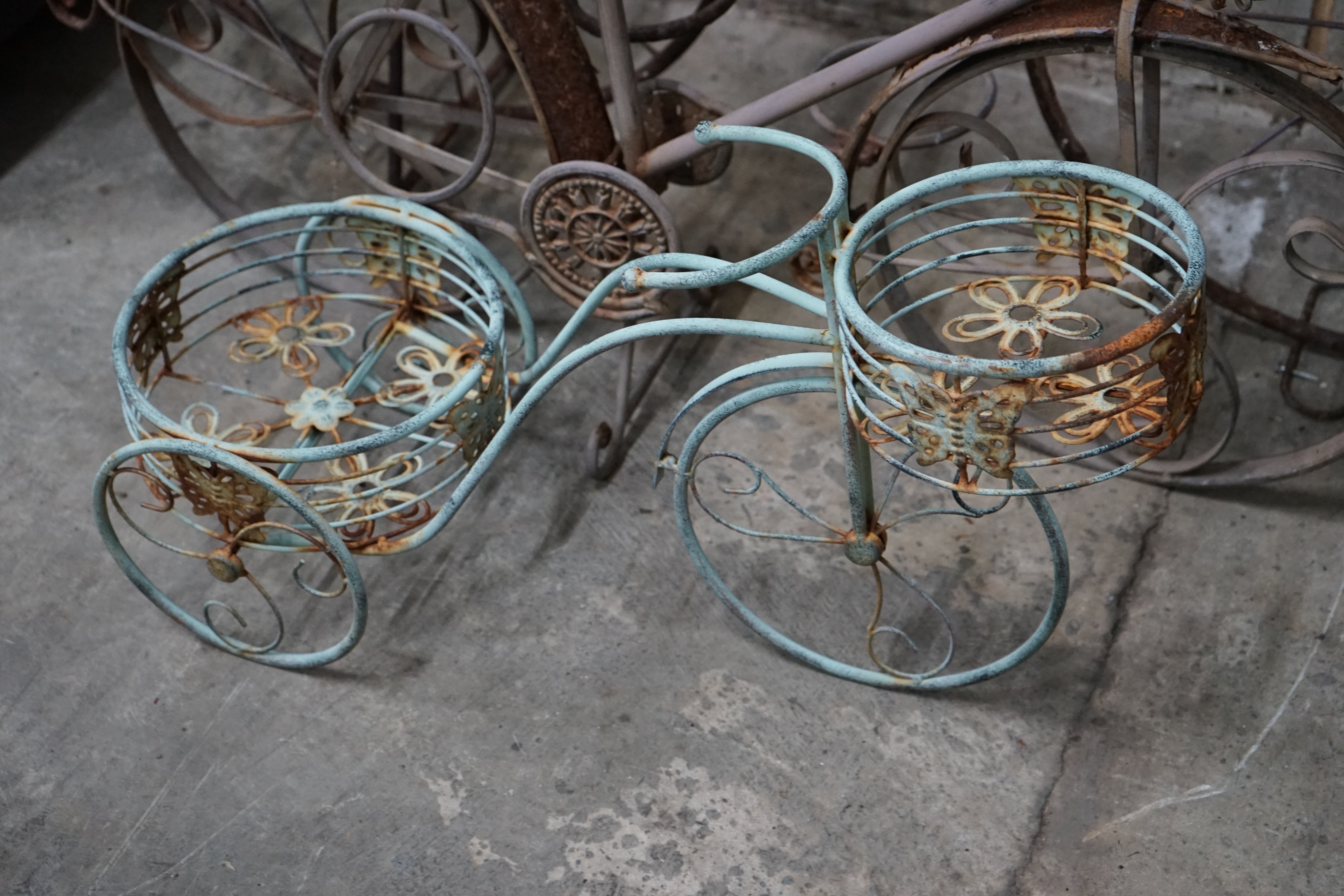 Three wirework bicycle garden planters, longest 120cm